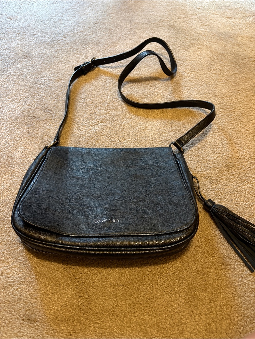 Calvin Klein Black Leather Crossbody with Tassel Accent